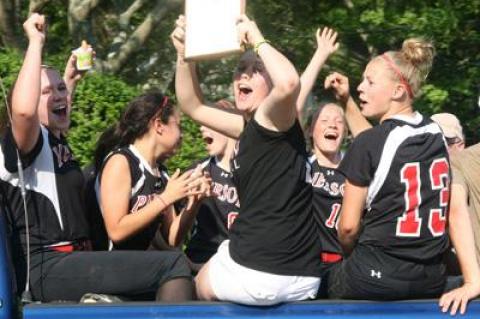 Joy reigned on the way to a parade down Sag Harbor’s Main Street following the Pierson girls’ county-championship win.