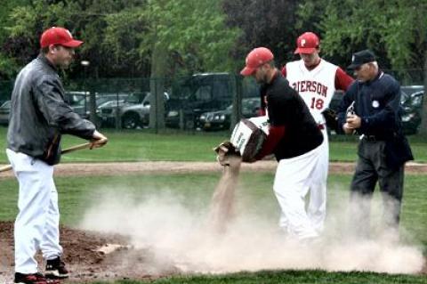 Henry Meyer and Jon Tortorella did their best to dry out the mound at Sag Harbor’s Mashashimuet Park on May 28, but the umpires postponed what proved to be the decisive county Class C baseball game until the following day.