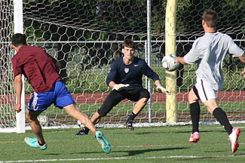 One of those who participated in East Hampton High’s first alumni boys soccer game Friday was Brandon West, whose Messiah College team won the national Division III championship last fall.