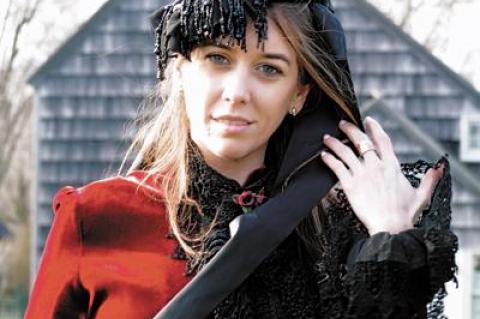 Michele Herger modeled a Victorian-era dress at Mulford Farm.