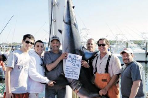 Lawrence Byrne and family caught this 369-pound mako during the Star Island Yacht Club tournament, the biggest catch of the day, but their boat, Pilar, reached the inlet 15 minutes too late to make them winners on Saturday afternoon.