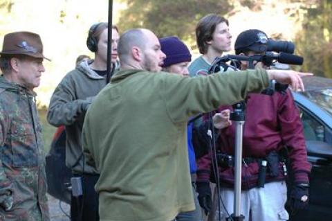 Brooks Elms, pointing, on the set of “Schooled.”