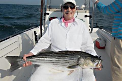 Ernie Baltz, visiting from Canada, went fishing with Ken Rafferty, a light-tackle and fly-fishing guide, on June 26 and caught this 20-pound striper near Little Gull Island on his first cast.