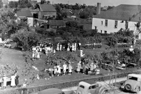 The Amagansett Presbyterian Church summer fair as seen from a high perch in 1939. The church will hold its 100th annual fair on Saturday.