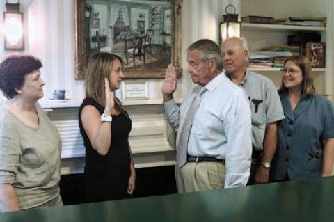 Becky Molinaro was sworn in as administrator of the Village of East Hampton by Mayor Paul F. Rickenbach Jr. on Monday at Village Hall. Witnessing the swearing in were Barbara Borsack and Bruce Siska of the village board and Pam Bennett, deputy clerk.