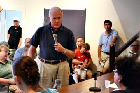 Residents of Sagaponack, including Gerard Kleinbaum, standing, gathered Saturday to ask questions about the village board’s idea to create its own police department.