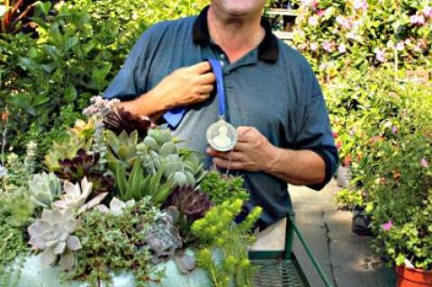 Don Horowitz, a co-owner of Wittendale’s Florist and Greenhouses, won a medal for his entry in the Kathy Pufahl Container Design Competition.