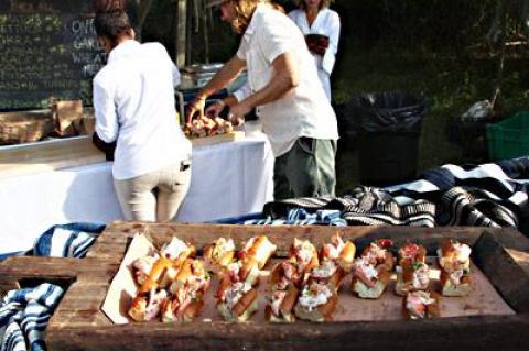 Lobster rolls served up from near the Quail Hill farm stand were among the hors d’oeuvres offered at the community-supported farm’s At the Common Table benefit Saturday.