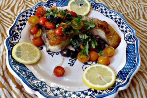 Acid and herbs are great complements to swordfish and can be improvised as needed, as in this Mediterranean-inspired recipe with black olives and tomatoes.