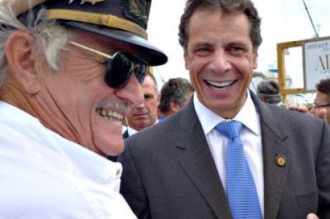 Gov. Andrew Cuomo shared a laugh with Capt. Paul Forsberg of Montauk’s Viking Fleet of party boats after vowing that the state would sue the federal government if New York’s fluke regulations are not put on a par with those of other coastal states.