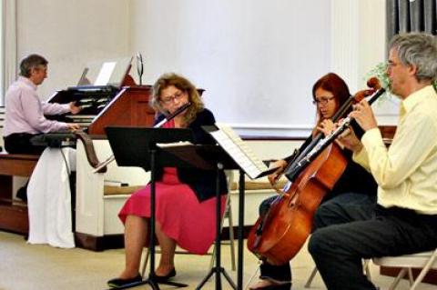 Bach & Forth, seen rehearsing on Friday, includes, from left, Thomas Bohlert, Linda DiMartino Wetherill, Rebecca Perea, Terry Keevil, and (not pictured) Trudy Craney, a soprano.