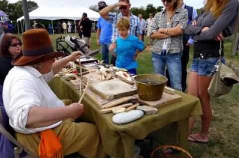 At the well-attended Montauk Archaeology Festival on Saturday, Arthur Kirmss showed a small group a display of wampum and other relics.