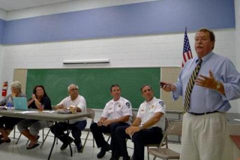 East Hampton Town Police Chief Edward Ecker faced the members of the Montauk Citizens Advisory Committee along with Capt. Mike Sarlo, second from right, and Lt. Chris Hatch during a discussion of traffic hazards on Second House Road.