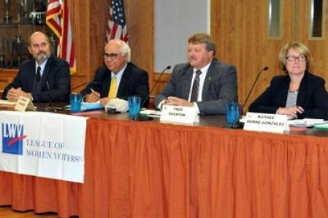 Four candidates for East Hampton Town Board, from left, Job Potter, Councilman Dominick Stanzione, Town Clerk Fred Overton, and Kathee Burke-Gonzalez, talked through the issues Monday night in East Hampton.