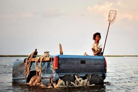 Quvenzhané Wallis received an Oscar nomination for best actress for her portrayal of Hushpuppy, seen here navigating her flooded bayou community in a makeshift raft in “Beasts of the Southern Wild.”