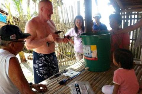 Brian Lydon of East Hampton demonstrated a water-filtration kit for victims of Typhoon Haiyan in the Philippines.