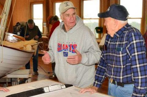 John Reinbold, left, with Don Schreiber, a member of the society, at the Community Boat Shop in Amagansett on Saturday