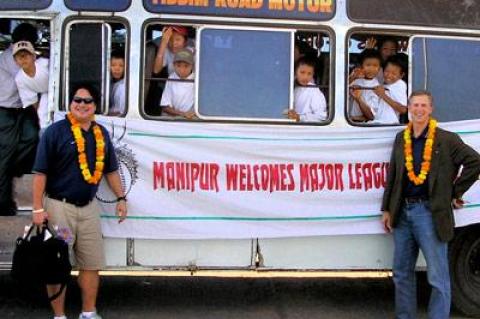 Envoy coaches from the U.S. pose with Manipuri baseball enthusiasts in Mirra Bank’s documentary “The Only Real Game.”