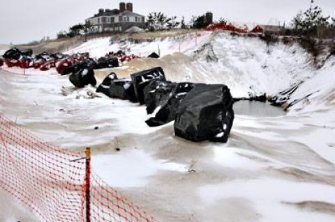 The construction of a rock revetment at Georgica Beach remains in limbo pending resolution of the East Hampton Town Trustees’ lawsuit against Mollie Zweig.