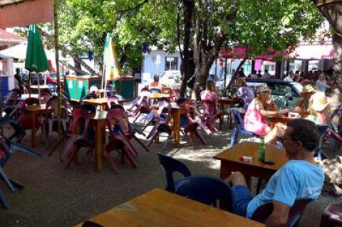 At La Select, dockside in Gustavia, St. Barth, patrons have a front-row seat for a parade of yacht denizens and other well-heeled visitors to the island.