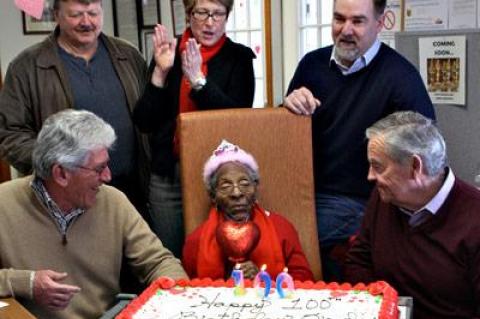 Oneda Dixon got best wishes from Supervisor Larry Cantwell, left, Mayor Paul F. Rickenbach Jr., right, and town board members Fred Overton, Kathee Burke-Gonzalez, and Peter Van Scoyoc.