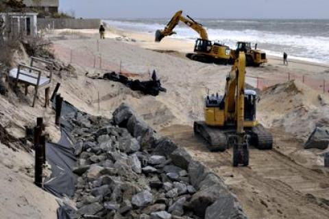 The controversial construction of a rock revetment on the beach in front of 11 West End Road in East Hampton resumed last week.