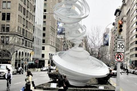 “Cyclone Twist,” above, and “Hoop-La,” below, two of seven large painted aluminum and fiberglass sculptures by Alice Aycock, were recently installed on the Park Avenue median between 52nd and 66th Streets.