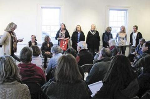 Town Councilwoman Sylvia Overby addressed a packed audience at Ashawagh Hall, while members of the East Hampton Arts Council, standing along the wall, looked on during the group’s first public meeting.