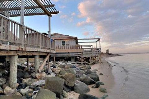 Flood-prone properties on Lazy Point, like these along the bay at the ends of Mulford Lane and Bayview Avenue, could be eligible for buyouts under a federal grant.