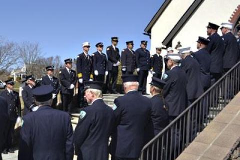 Members of the Montauk Fire Department lined the stairs to St. Therese of Lisieux Catholic Church Sunday during an ecumenical memorial service that is the first of many 75th anniversary events planned this year.