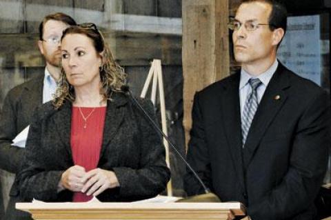 Steve Couch, at rear, and Anthony Ciorra of the Army Corps of Engineers and Sue McCormick of the state’s Department of Environmental Conservation laid out plans for the downtown Montauk beachfront.