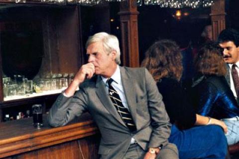 George Plimpton looking pensive. Was he pondering a gig as a bartender?