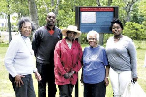 Celebrating good news for the St. David A.M.E. Zion Cemetery were, from left, Kathleen Tucker, the Eastville Community Historical Society’s historian; Gary Cole, whose great-grandmother was buried there; Gloria Primm Brown; Eunice Jackie Vaughan, the society’s president, and Georgette Grier-Key, the society’s director.