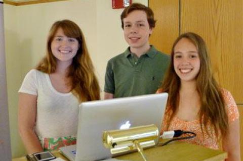 Daisy Kelly, left, Conrad Kabbaz, and Serrana Mattiauda, interns with the Third House Nature Center, talked about the health and environs of Big Reed Pond in Montauk on Friday.