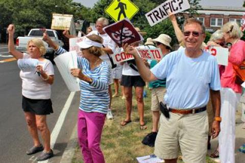 About 40 people protested a proposed CVS pharmacy at the corner of Main Street and the Bridgehampton-Sag Harbor Turnpike in Bridgehampton last Thursday.