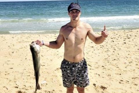 Danny Savage caught this 32-inch striped bass on Amagansett’s ocean side Sunday.