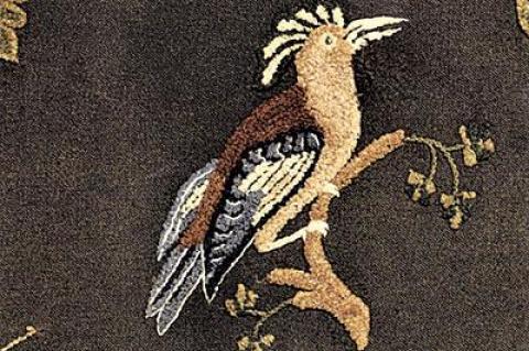 A hoopoe bird, a detail from Mercy Huntting’s yarn-sewn rug. At the time the rug was made, in the early 19th century, well-read people were captivated by the exotic birds and flowers. The hoopoe is native to North Africa and Eurasia.