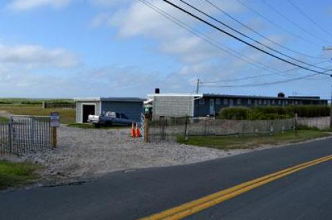 What is now an open driveway behind the former East Deck Motel in Ditch Plain is to be transformed into a sloping, below-grade parking area, leading to loading docks beneath a new, two-story building behind the existing structures.