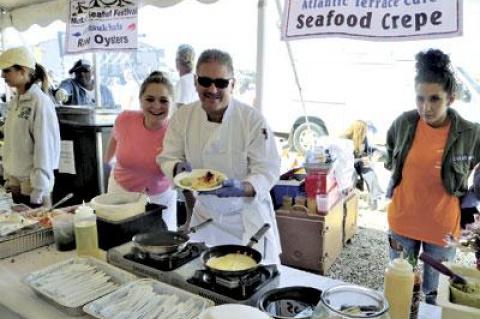 Among the many choices at the Montauk Seafood Festival, Steven Paluba and Candace Ethridge of the Atlantic Terrace Beach Cafe offered a seafood crepe with shrimp.