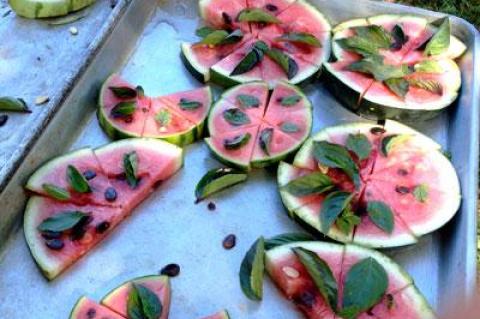 For dessert the farmers served fresh, many-hued watermelon slices with Thai basil, lime juice, and honey.