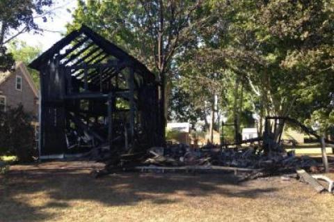 Little is left of the barn at 602 Townline Road in Sagaponack after a fire on Sunday.