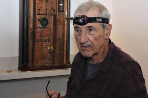 Stanley Bitterman recently made repairs to an 1840s mantel clock from the Talmage family at the East Hampton Farm Museum, which opens to the public on Saturday.