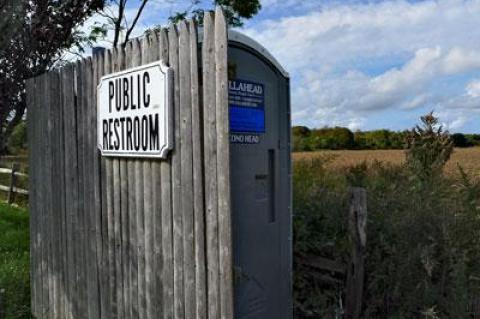 A portable lavatory in the parking lot behind Amagansett’s commercial district will be obsolete after the expected completion of a public restroom next year.