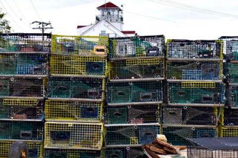 A wall of lobster pots spells the end of a season.