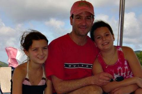 Douglas Schneiderman, with his daughters Isabelle, left, and Rachael, right, loved the time he spent with his family on the South Fork. He died in a head-on collision on Route 114 on the first day of his vacation in 2012.