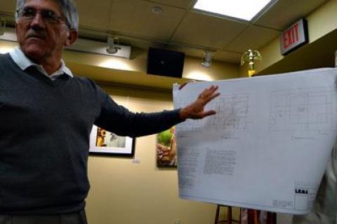 East Hampton Town Supervisor Larry Cantwell displayed a blueprint for a public restroom to be constructed in the parking lot behind the Amagansett Library at that hamlet’s citizens advisory committee meeting on Monday.