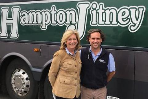 Geoff Lynch, the president of the Hampton Jitney, seen with Joan Overlook of Goodcircle, will donate buses and drivers to get I-Tri athletes to their swim practices.