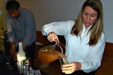 Cristina Mello, the manager of the East Hampton Golden Pear store, poured out the rum and drink samples before and after the “Distill Life” panel discussion at the Parrish Art Museum on Friday night.