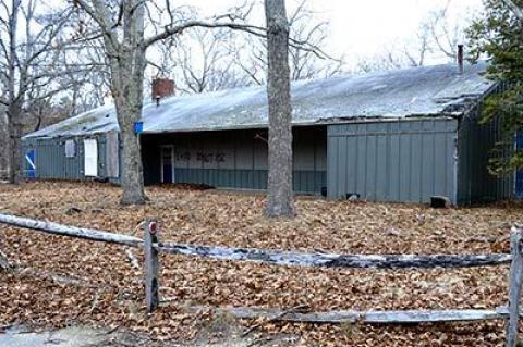 The mess hall building at the former Boys Harbor camp in East Hampton, now owned by the town, could become an open-air pavilion for a while, until it can be rebuilt.