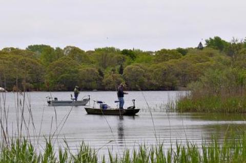 Fishermen plied the waters of Fort Pond in Montauk last month.